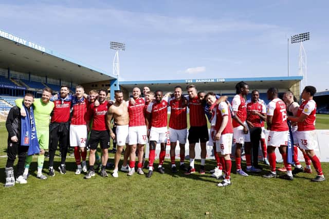 Rotherham United celebrate promotion after the final whistle of the Sky Bet League One match at the MEMS Priestfield Stadium, Gillingham. Picture date: Saturday April 30, 2022. PA Photo.