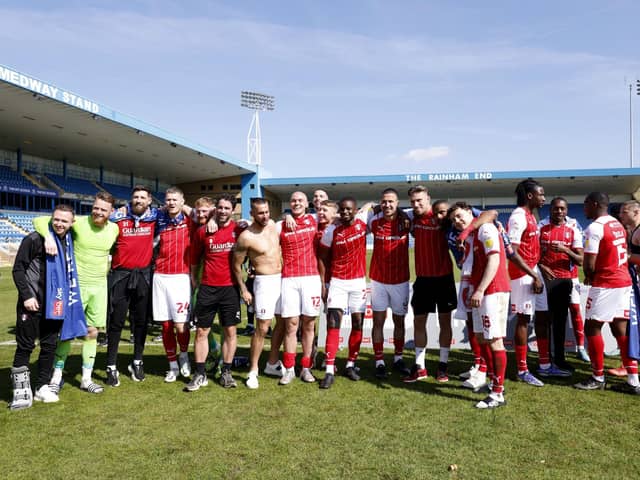 Rotherham United celebrate promotion after the final whistle of the Sky Bet League One match at the MEMS Priestfield Stadium, Gillingham. Picture date: Saturday April 30, 2022. PA Photo.