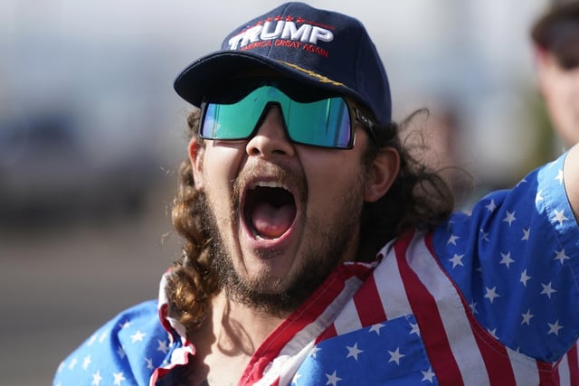 A supporter of President Donald Trump shouts during a rally outside the Maricopa County Recorder's Office. (AP Photo/Ross D. Franklin)