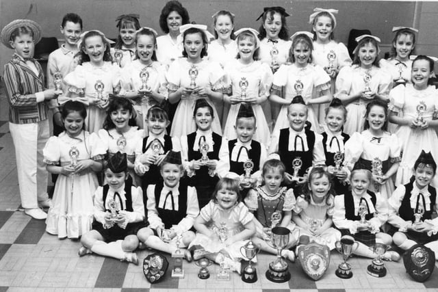 Members of the Valerie Shepherd School of Dancing with the trophies they won in a competition in March 1990. Does this bring back memories?