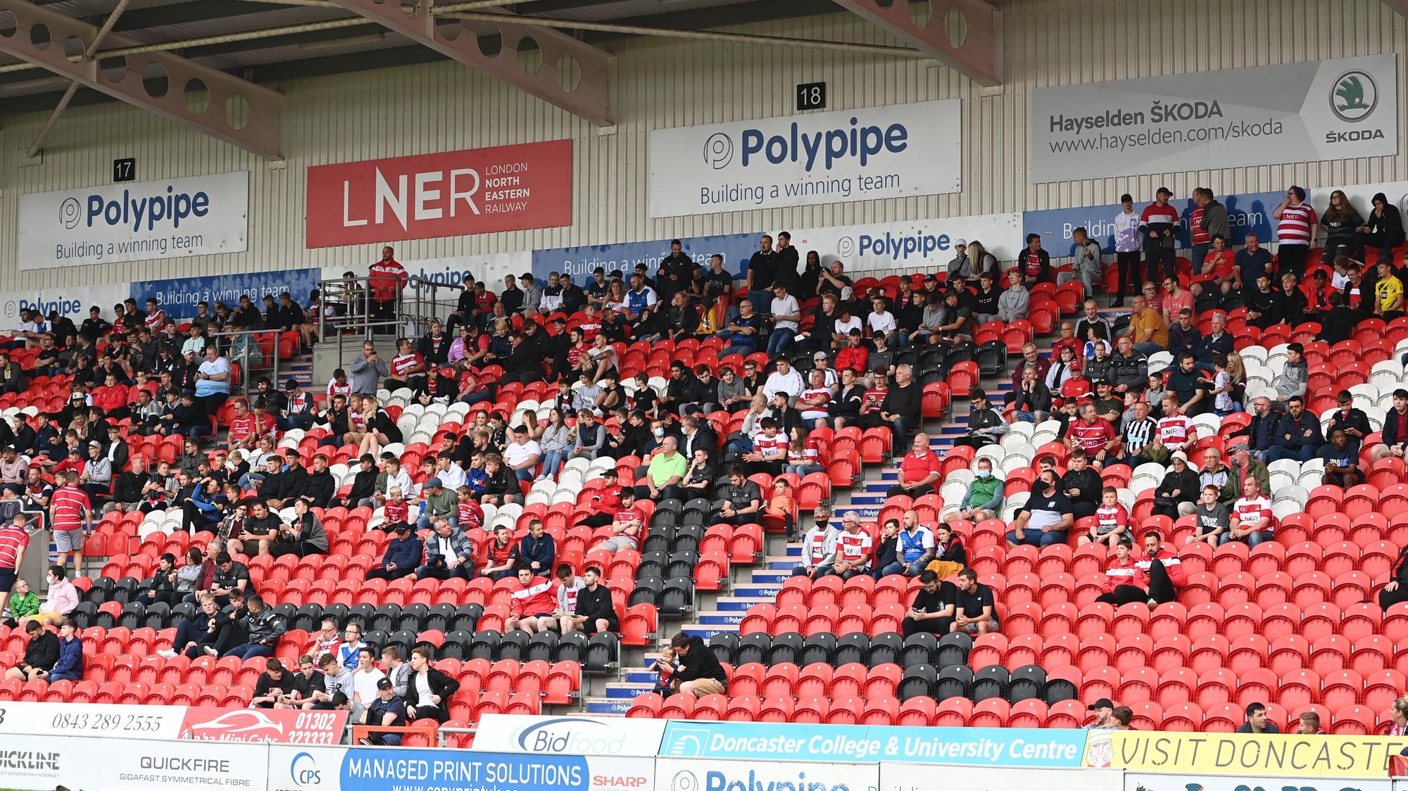 Supporters were back in the stands at the Keepmoat for a Rovers game for the first time since February 2020. Picture: Howard Roe/AHPIX