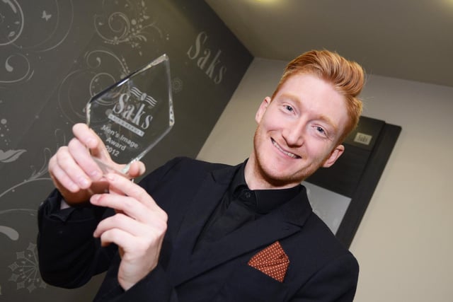 Paul Calladine, pictured with his national men's image award in 2013