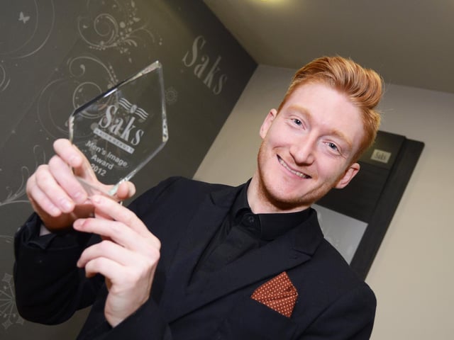 Paul Calladine, pictured with his national men's image award in 2013