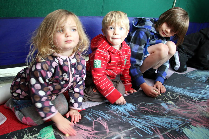 Rebekah Ryde, Otto Williams and Tom Finney get creative as they take part in the Matlock Live! Big Draw in Hall Leys Park, Matlock, in 2010.