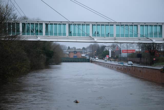 The River Don flows close to Meadowhall shopping centre in Sheffield