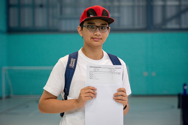 Justin Dizon with his results, A, B and C at UTC College in Portsmouth. Picture: Habibur Rahman