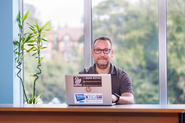 Kevin working at Black Swan Cyber Security Solutions