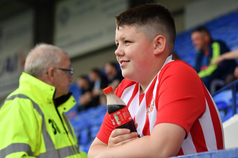 A young Sunderland fan enjoying being back at the football.