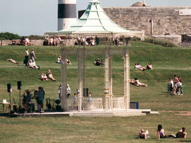 Crowds enjoy the sunshine at the bandstand in Southsea Common in June 1998.