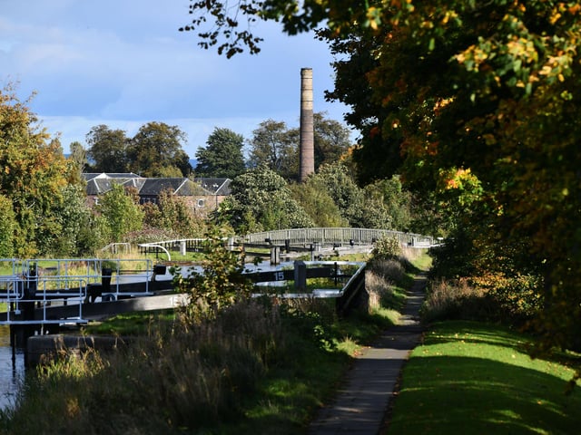 The Forth and Clyde Canal with Rosebank Distillery in the distance.