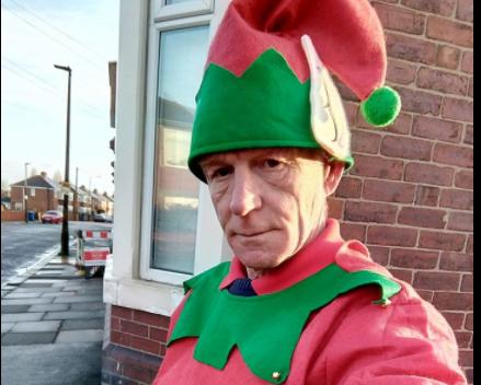 Postman David Evans on his rounds in Edlington