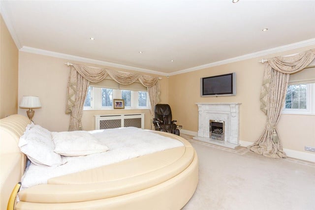 There are five good sized bedrooms in total, all of which have fitted wardrobes, with the master boasting a marble fireplace, fitted dressing room and a spacious en-suite bathroom.