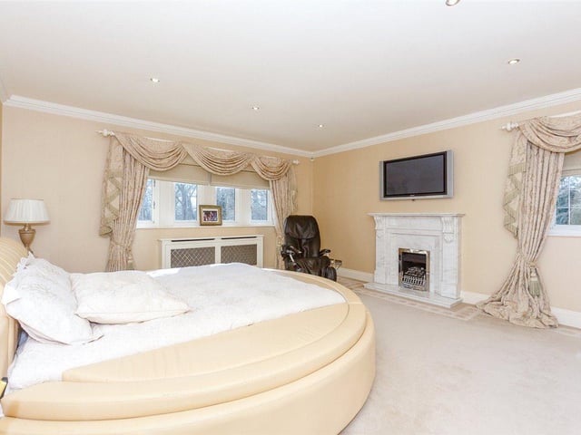 There are five good sized bedrooms in total, all of which have fitted wardrobes, with the master boasting a marble fireplace, fitted dressing room and a spacious en-suite bathroom.