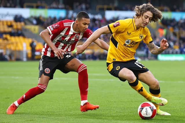 Fabio Silva of Wolverhampton Wanderers is closed down by Kyron Gordon of Sheffield United (Mark Thompson/Getty Images)