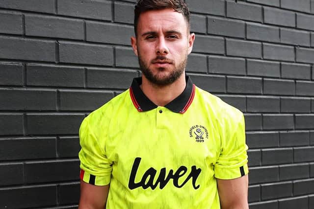 George Baldock in the retro replica Sheffield United away shirt from 1989-91 which is being re-released later this month
