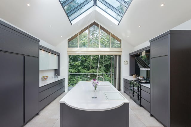 The stunning kitchen, undoubtedly the hub of the house, is fitted with a comprehensive range of units, incorporating top of the range appliances and a three-oven electric Total Control Aga.