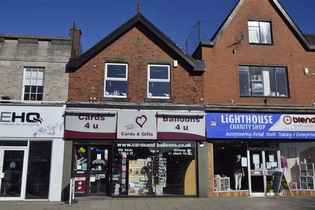Estate agent Richard Savidge is inviting offers of more than £150,000 for this two-storey spacious unit in a prime location with 835 sq feet of ground-floor retail space and a storeroom above.