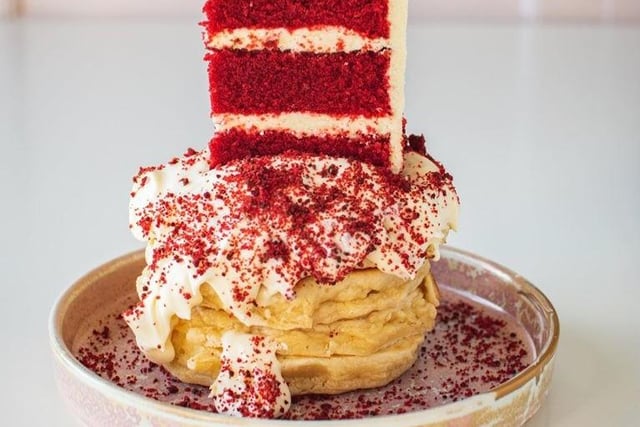 Why have pancakes or cake when you can have both? The Red Velvet stack is topped with cream cheese frosting and a slice of Red Velvet cake.