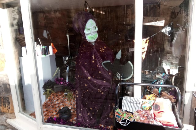 Hidden away on Bow Alley just a few yards from Alnwick Castle, you'll find M A Tailoring's Halloween shop window.