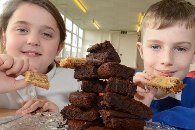 Lyla Simpson,8, and Shaun Dennis,9, were impressed with the tower of brownies at a Fairtrade coffee morning 5 years ago.