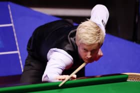 Neil Robertson of Australia plays a shot during the Betfred World Snooker Championship Round One match between Neil Robertson of Australia and Ashley Hugill of England at Crucible Theatre on April 18, 2022 in Sheffield, England. (Photo by George Wood/Getty Images)