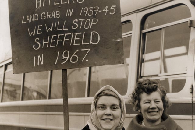 Ivy Standell of Carlton Close, Mosborough, Nr. Sheffield, with an eye-catching placard, that reads 'We stopped Hiteler's long grab in 1939-45 we will stop Sheffield in 1967' arrives