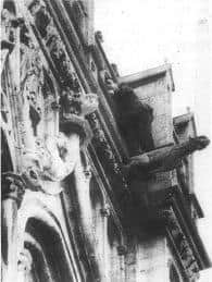Ian Wood clinging to the gargoyle at Amiens Cathedral prior to his arrest