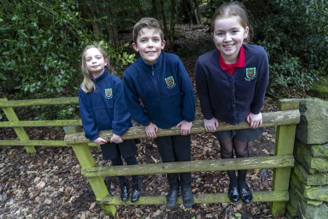 Pupils Nieve, Harry and Chloe from Loxley Primary School who have joined a campaign to celebrate Robin of Loxley.  Picture Scott Merrylees