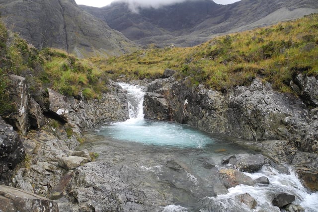 The Fairy Pools are located at Glenbrittle on the Isle of Skye and are beautiful rock pools of crystal clear spring water fed by a series of waterfalls from the Cuillin Mountains.