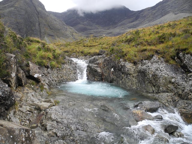 The Fairy Pools are located at Glenbrittle on the Isle of Skye and are beautiful rock pools of crystal clear spring water fed by a series of waterfalls from the Cuillin Mountains.