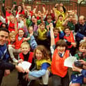 Sheffield Wednesday's Ryan Jones (left) and Ian Knight (right) pictured with pupils from the Greengate Lane Primary School, High Green, Sheffield, after a coaching session, December 9, 1996