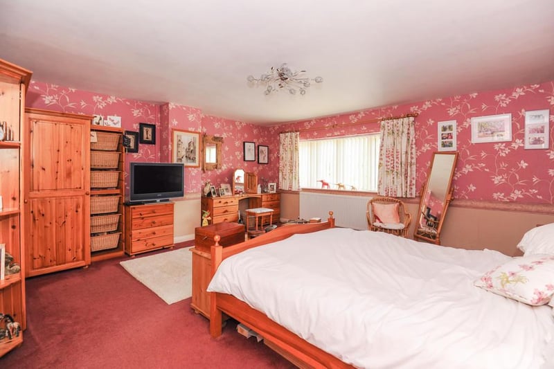 The main bedroom has a large ensuite and fitted wardrobes.