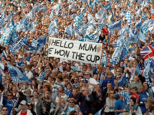 Fans at the FA Cup parade on the Sunday. Picture: Malcolm Wells 082235-266