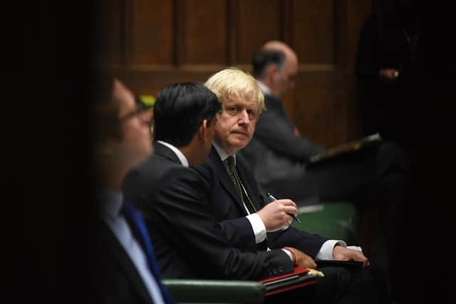 Prime Minister Boris Johnson after making a statement in the House of Commons in London, setting out a new three-tier system of controls for coronavirus in England.