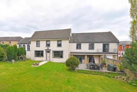 The house is described as a substantial five bedroomed detached residence, situated on a sizeable, private plot.