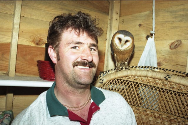 Paul Frame with the owl which was living in his shed in 1996.