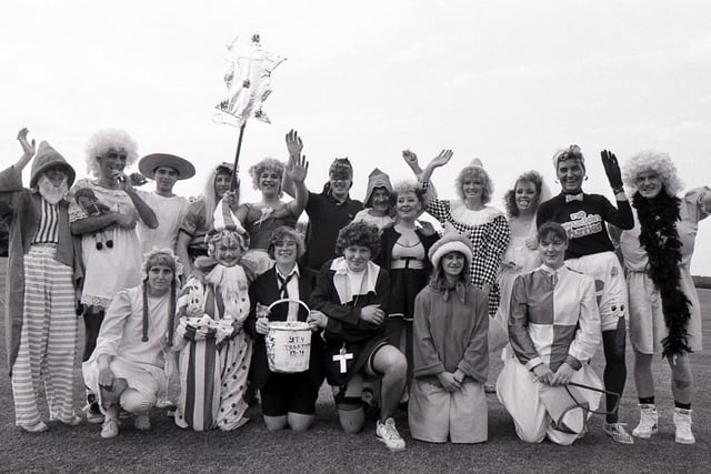 A fancy dress rounders match to raise money for charity at Concord Sports Centre.
