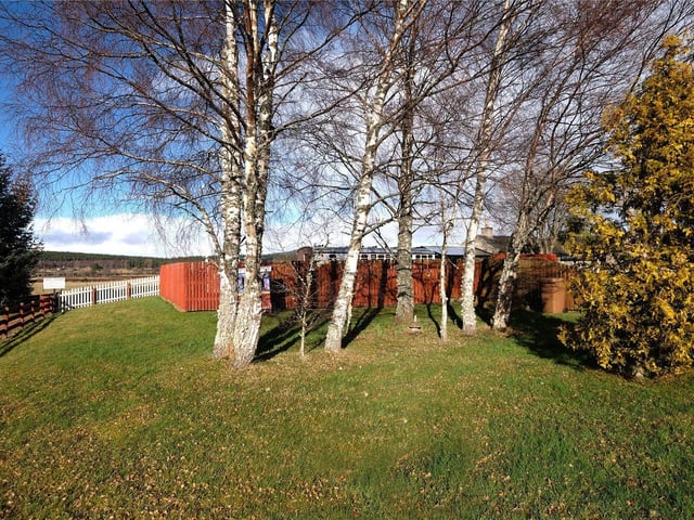 Within the grounds is a range of outbuildings including an office which could be converted to a garage, two workshops, a summer house and garden sheds.