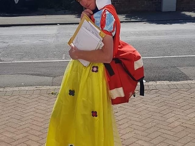 Postman David Evans on his rounds in Edlington