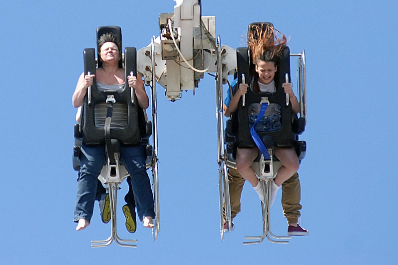 Enjoying the thrills of a fairground ride in 2013. Recognise them?