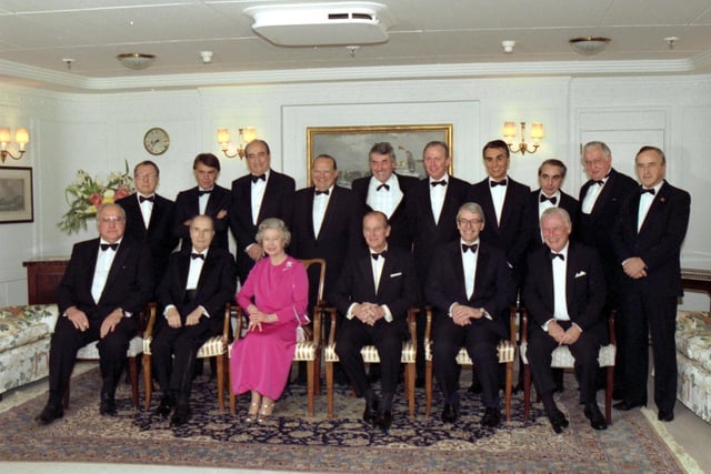 Queen Elizabeth II and Prince Philip Duke of Edinburgh pose for a group photograph with their guests, the European heads of government, on board the Royal Yacht Britannia, during the European Summit, being held in Edinburgh in December 1992.