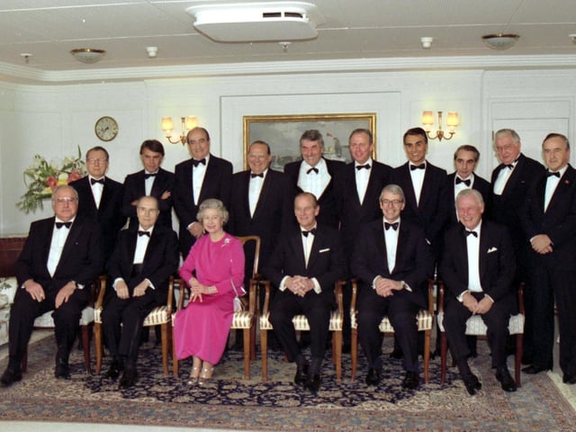 Queen Elizabeth II and Prince Philip Duke of Edinburgh pose for a group photograph with their guests, the European heads of government, on board the Royal Yacht Britannia, during the European Summit, being held in Edinburgh in December 1992.