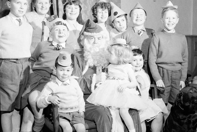 Chief Constable W Merrilees acts as Santa Claus at an Edinburgh Children's Home Christmas party in 1962.