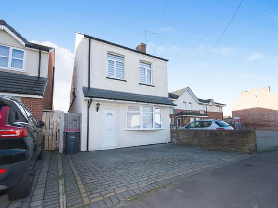 The detached home has three bedrooms and is on Flanderwell Lane, Sunnyside.