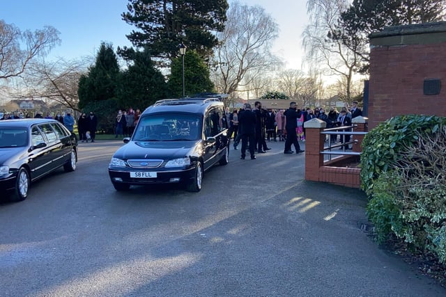 Nicola's coffin is carried into the chapel for the service. Picture by Frank Reid