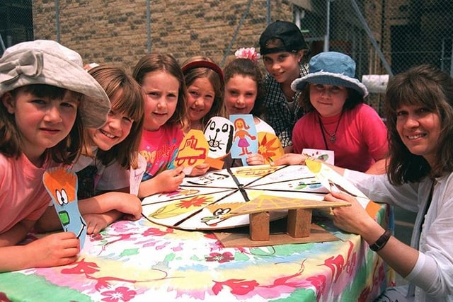 Maggie Keogh runs the Wheel of Fortune stall at the Sheffield High School fun day in June 1996