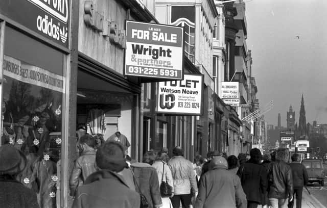 Shops For Sale or To Let signs in Princes Street Edinburgh, February 1984.