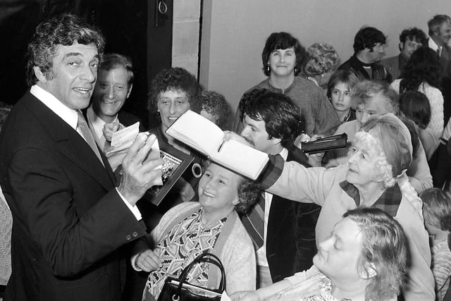 Frankie Vaughan signing autographs