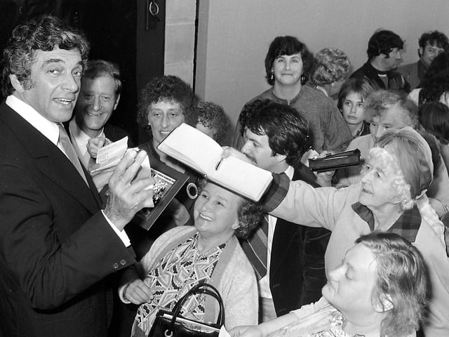 Frankie Vaughan signing autographs