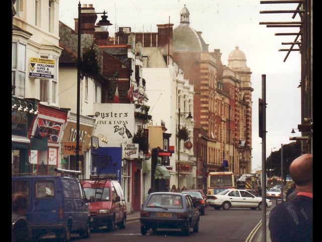 This snap offers another throw back to the 90s in Osborne Road. You can see the sign for the now gone Oysters Wine and Tapas Bar. You can also see the neon sign of the chemist and the Queens Hotel in the distance.